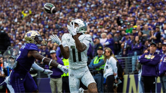 Oregon Ducks wide receiver Troy Franklin catches a touchdown pass against the Washington Huskies.